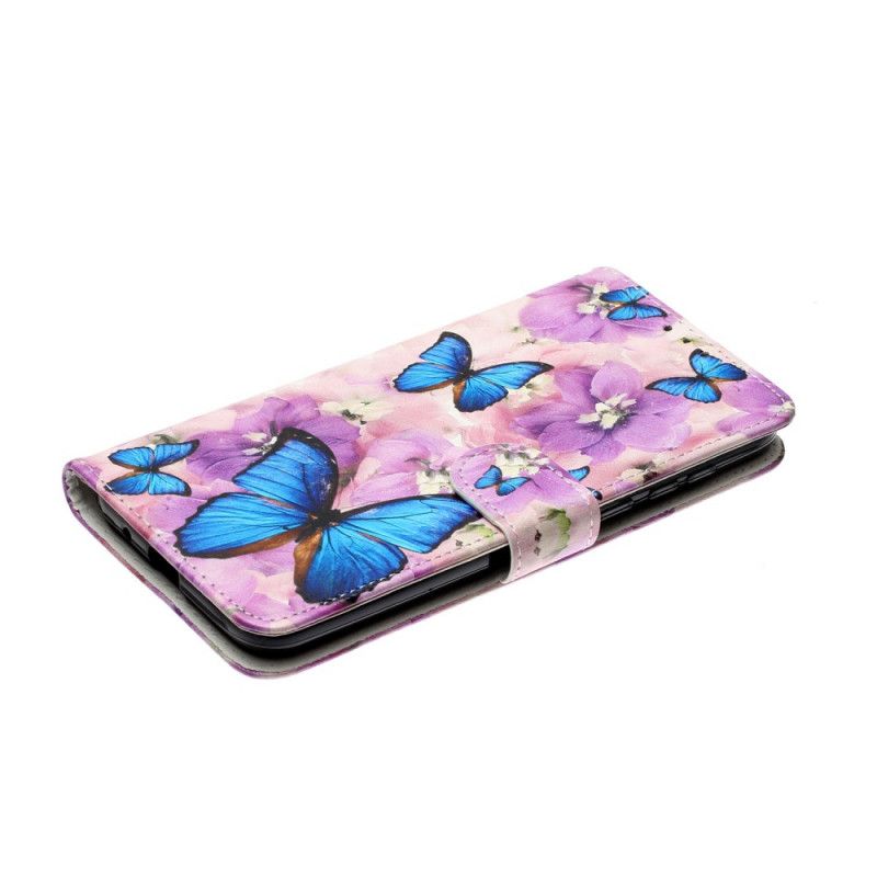 Flip Cover Huawei Y5p Mobilcover Blå Sommerfugle I Blomsterne