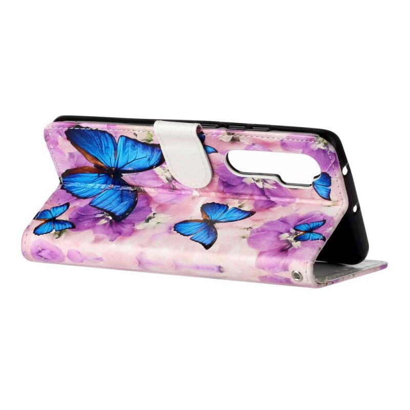 Flip Cover Xiaomi Mi Note 10 Lite Mobilcover Blå Sommerfugle I Blomsterne