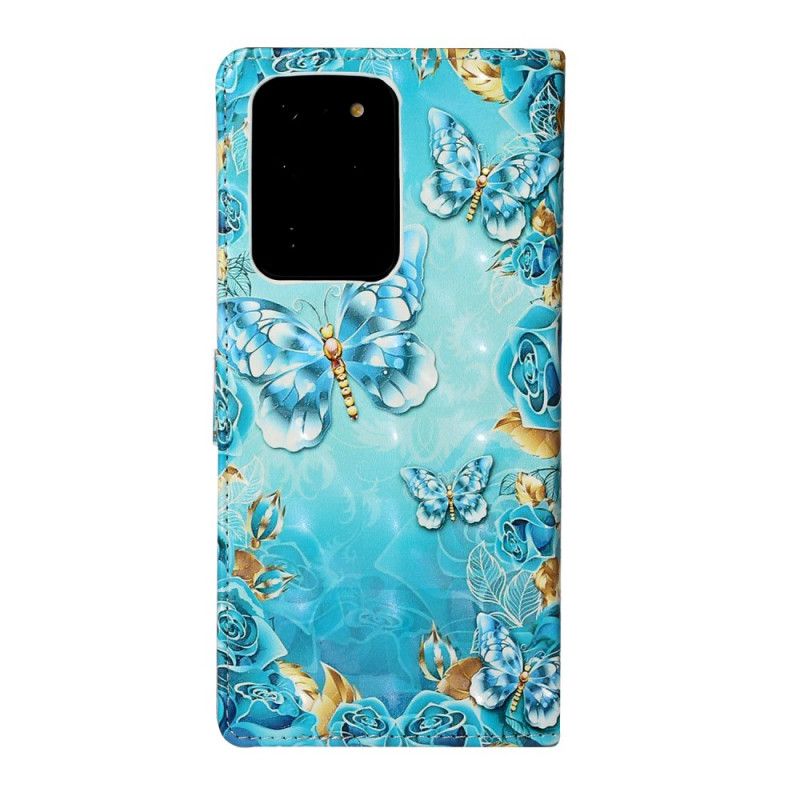 Flip Cover Læder Samsung Galaxy S20 Ultra Sommerfugle Og Blomster På En Blå Baggrund Beskyttelse