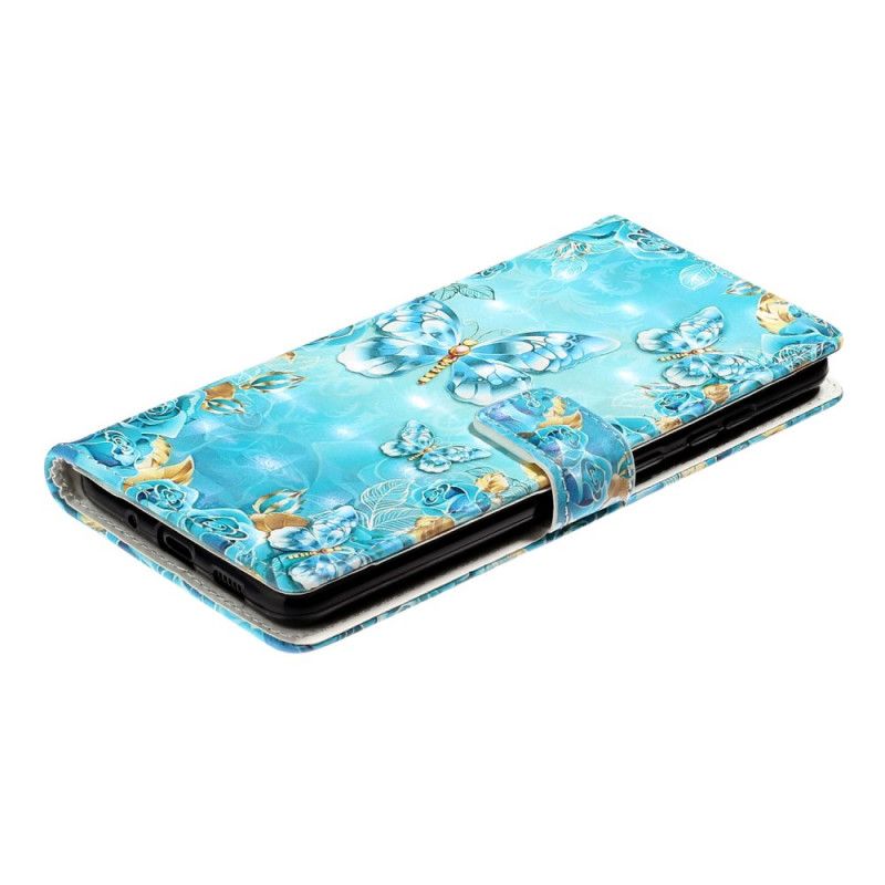 Flip Cover Læder Samsung Galaxy S20 Ultra Sommerfugle Og Blomster På En Blå Baggrund Beskyttelse