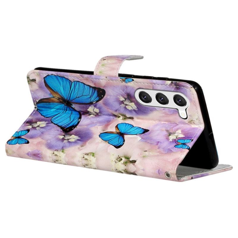 Flip Cover Til Samsung Galaxy S24 5g Lilla Blomster Og Sommerfugle Med Rem