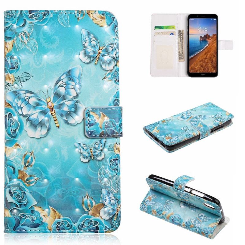 Flip Cover Xiaomi Redmi 7A Mobilcover Sommerfugle Og Blomster På En Blå Baggrund