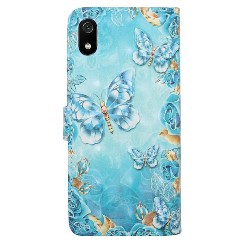 Flip Cover Xiaomi Redmi 7A Mobilcover Sommerfugle Og Blomster På En Blå Baggrund